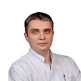 Врач Коновалов Евгений Александрович